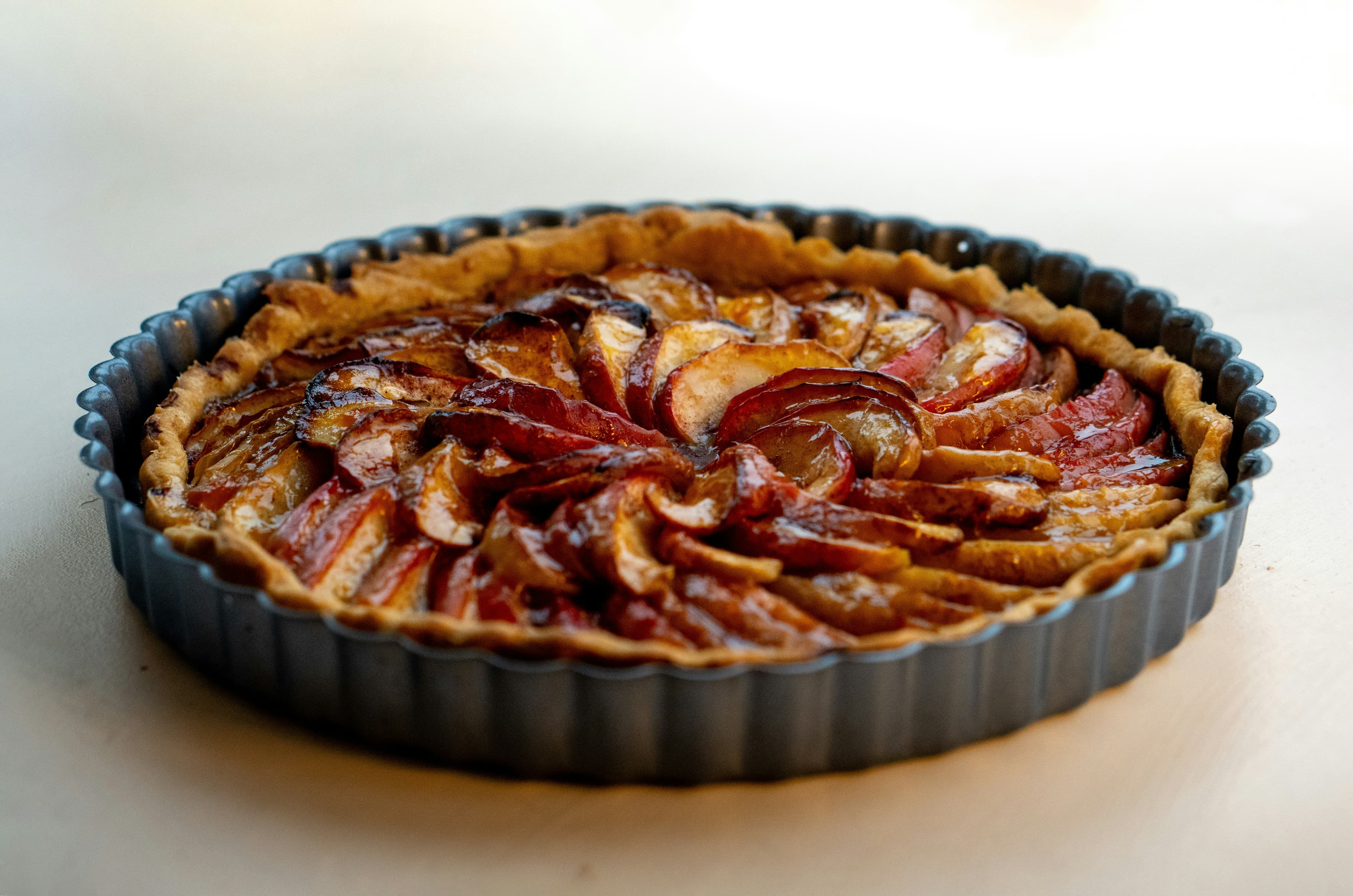 Poached pear and almond tart
